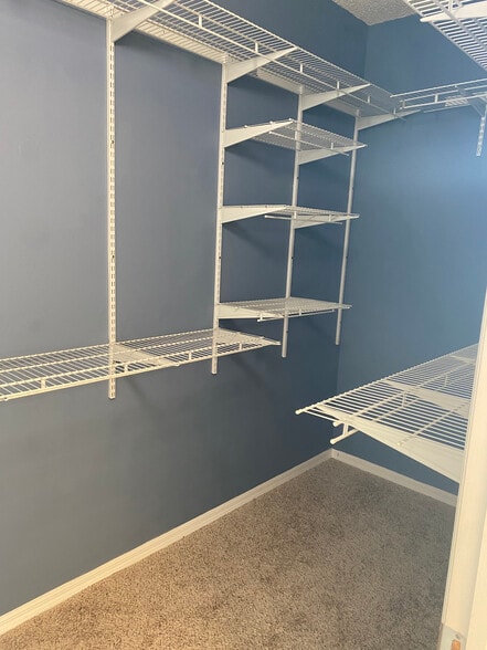 Owner’s walk-in closet - 4763 Travini Cir