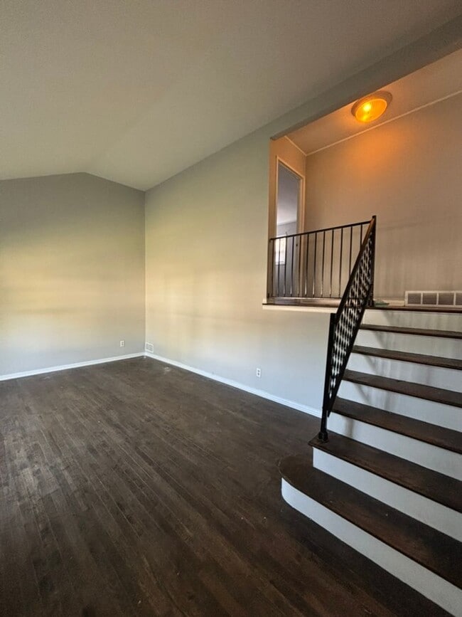 Building Photo - 3 BR 1.5 BA split-level with attached 1 ca...
