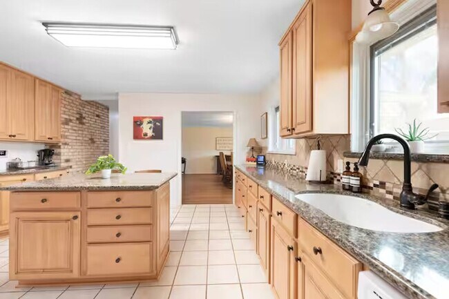 Building Photo - 3 Bed, 3 Bath Home with Expansive Kitchen, Two Living Areas & Private Suite
