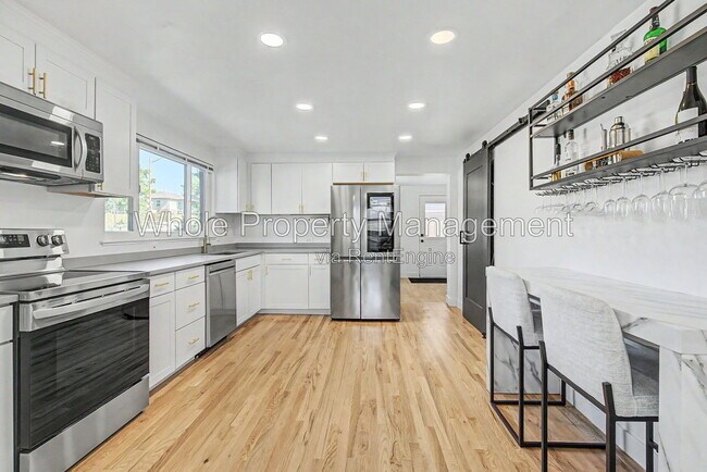 Building Photo - 3038 Sheridan Blvd