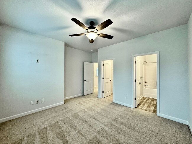 Building Photo - A 1st-Time Rental Available NOW! 3/3.5 Newer End-Unit Townhome w/Garage - Landscaping Included!