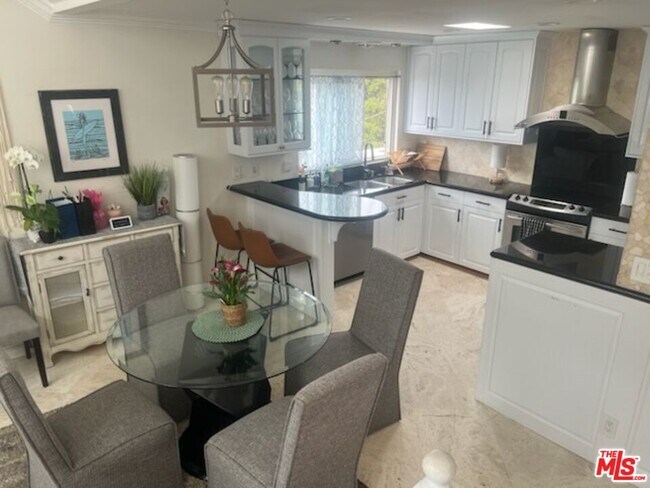 Building Photo - 6400 Pacific Ave