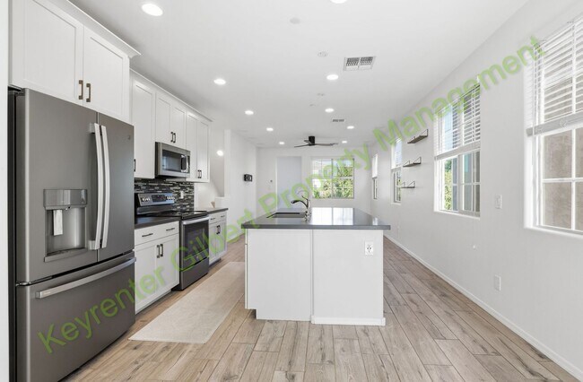 Building Photo - Modern Gilbert Lakeview Townhome in The La...