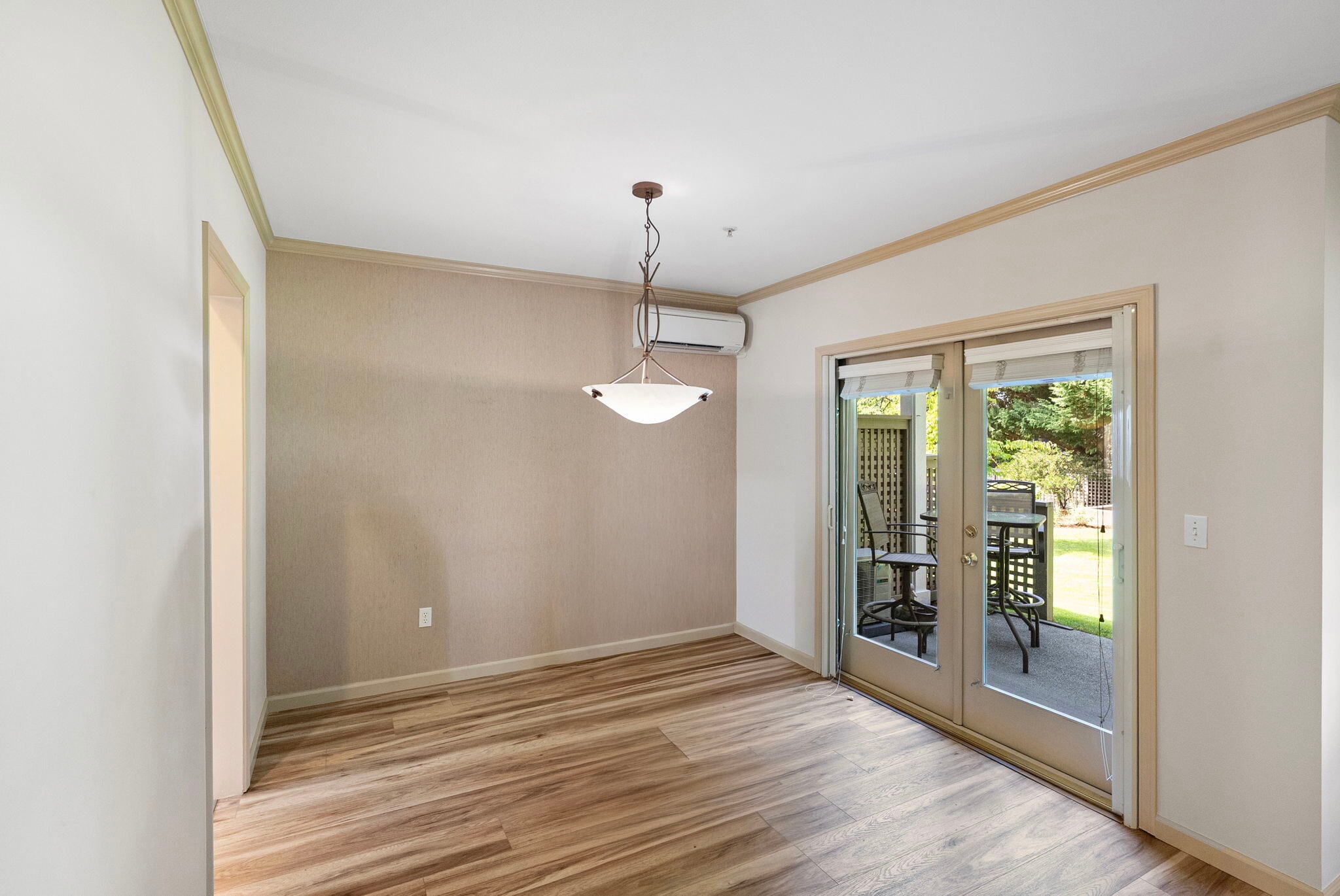 Living/dining area with French doors into back patio - 1220 Weaver Rd NW