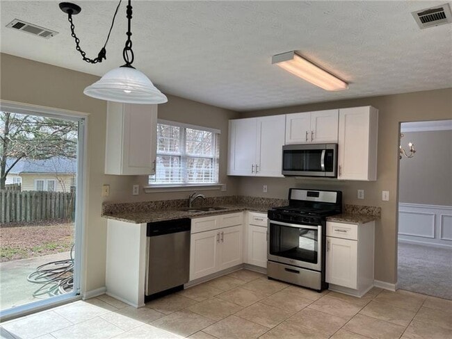 Building Photo - 1348 Woodcutt Pl