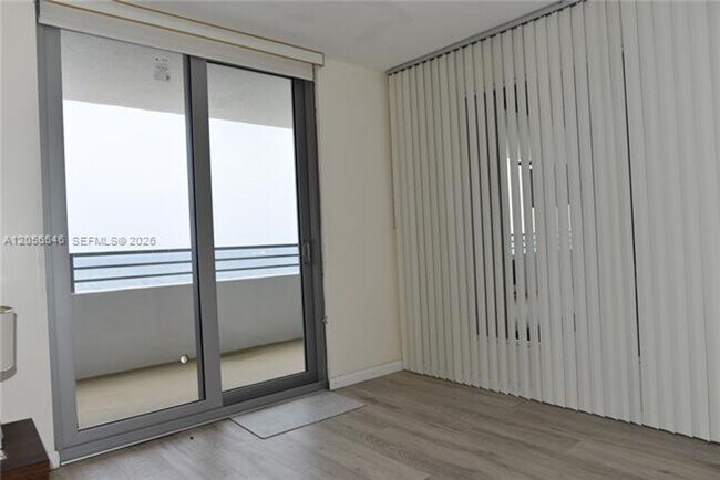 Building Photo - 5555 Collins Ave