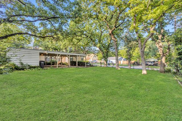 Building Photo - 6324 Woodbine Dr