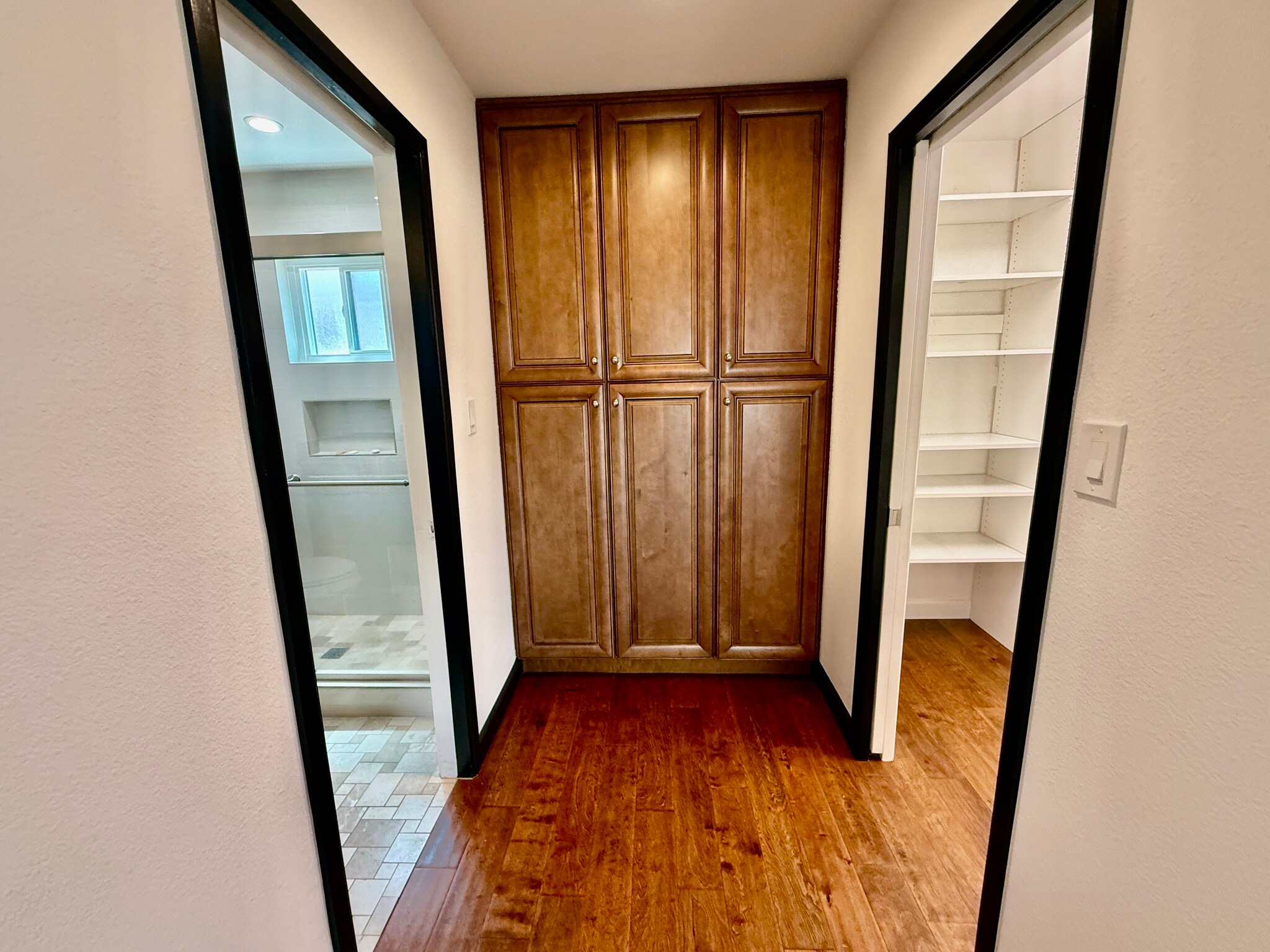Primary Bedroom Storage - Walk-in Closet to the right, Bathroom to the left. - 2816 E Laurel Ln