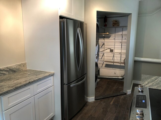 Kitchen looking into Pantry / Washer/Dryer Closet - 401 W Saulnier St