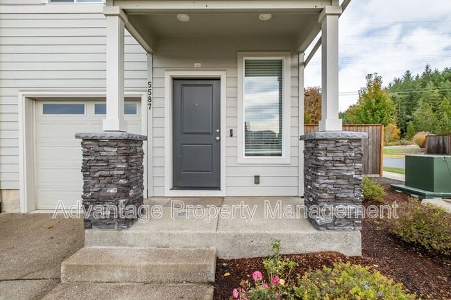 Building Photo - 5587 NW Torchcrest Pl