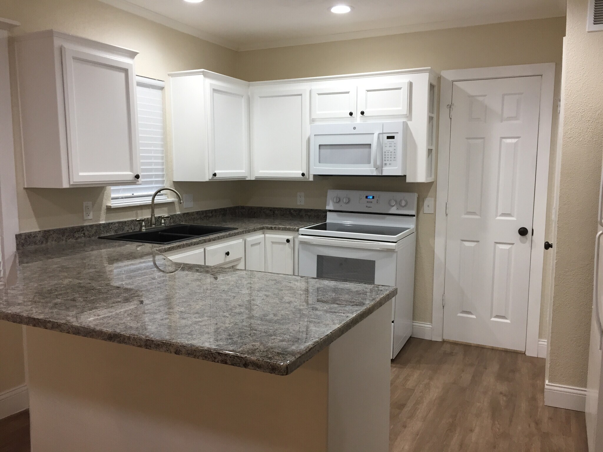 Kitchen and pantry door - 310 East 3rd St.