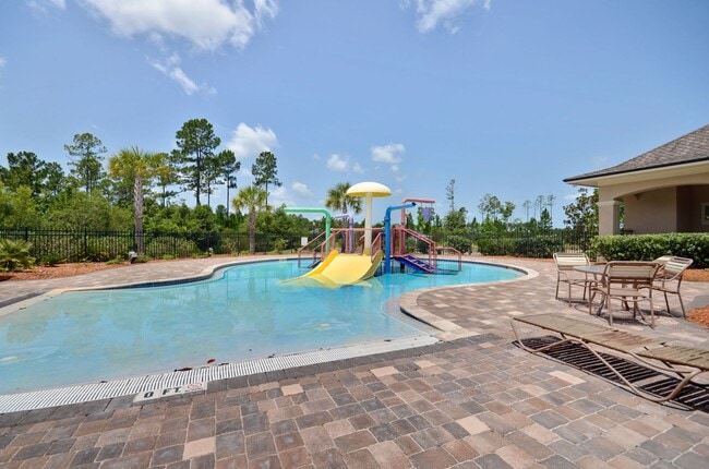 Building Photo - Modern 4BR Home with 3 Full Baths in River Glen | Screened Porch & Resort-Style Amenities