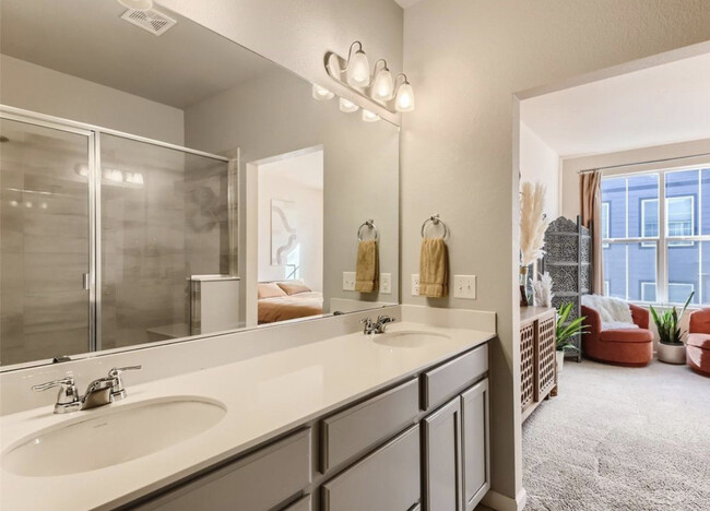 Primary Bathroom w/ Walk-In Closet - 9269 Garnett St