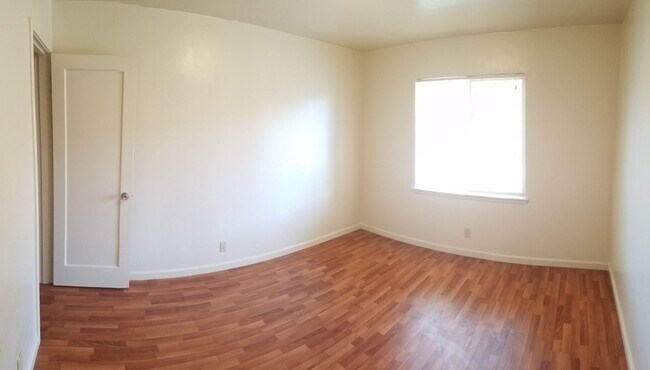 Building Photo - Renovated 1-Bedroom with Garage Parking & ...