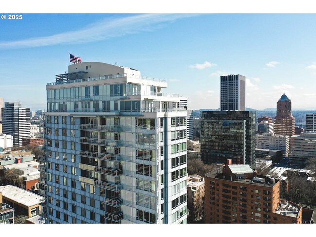 Building Photo - Modern 2-Bed/2-Bath Condo with Balcony & Prime Downtown Location