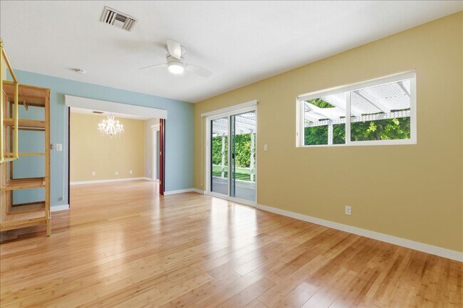 Building Photo - 3 bed / 2 Bath Mid-Century Home with Two-Car Garage, Soaking Pool and Manicured Backyard!