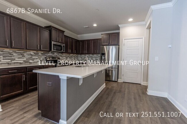 Building Photo - 6867B Spaniel Dr.-