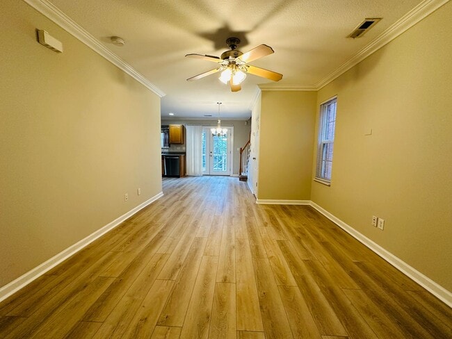 Building Photo - 2 bed, 2.5 bath updated townhouse w/ 1-car garage & Trex deck available now