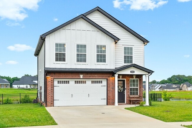 Building Photo - Stocked Pond, Walking Trails and More!!