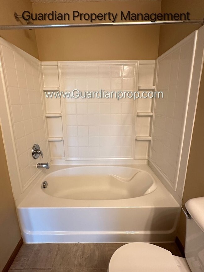 Building Photo - Pet Free Champlin Town Home, 3.5 Baths, 2 Car Garage, Dishwasher, Balcony, Available end of April