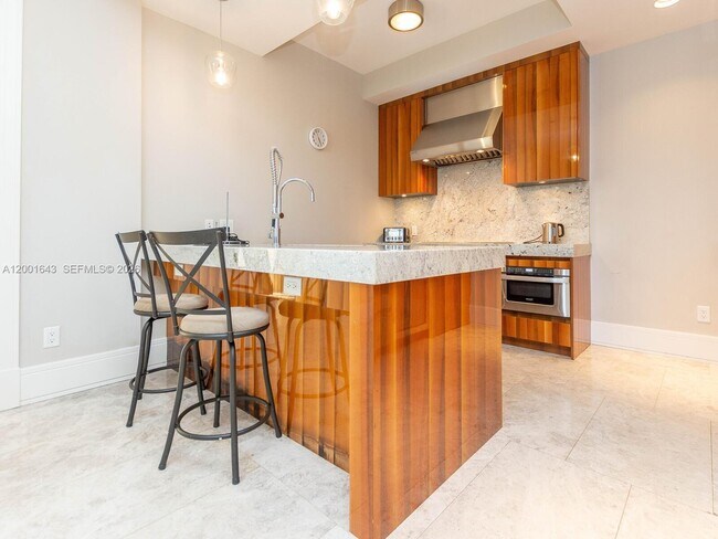 Building Photo - 9705 Collins Ave