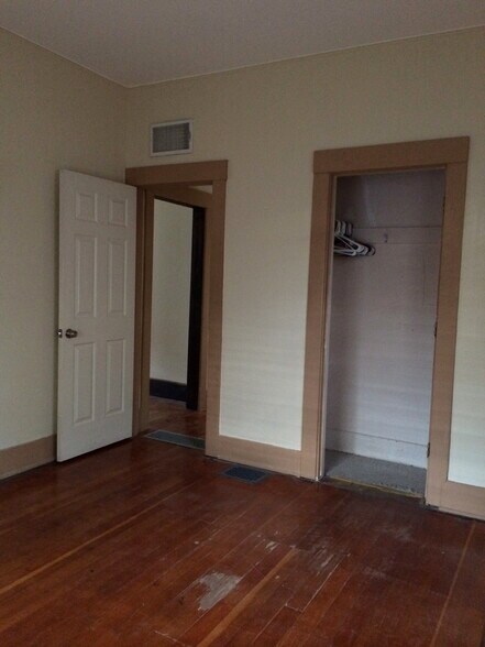 Front bedroom door to hallway, living room to the left - 525 N 1st Ave