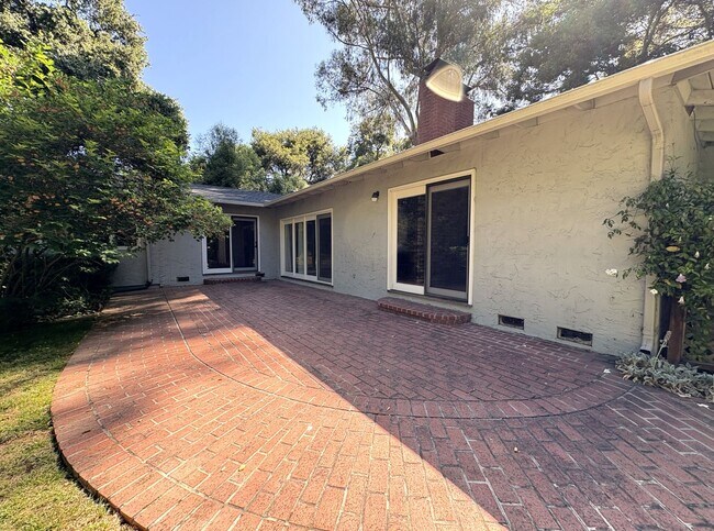Building Photo - Beautiful Serene 4-Bedroom Home on a Gated...