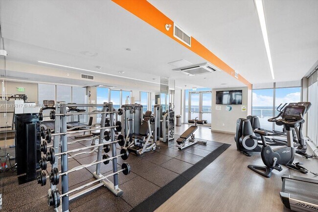 Building Photo - 10155 Collins Ave