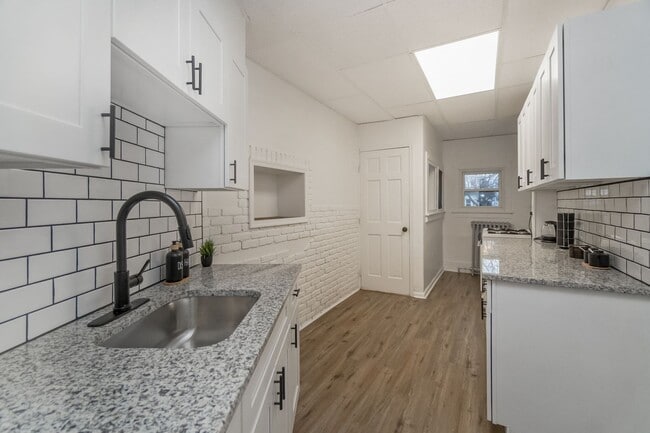 Building Photo - Affordable 3BR Home with Private Yard – Walk to Downtown!