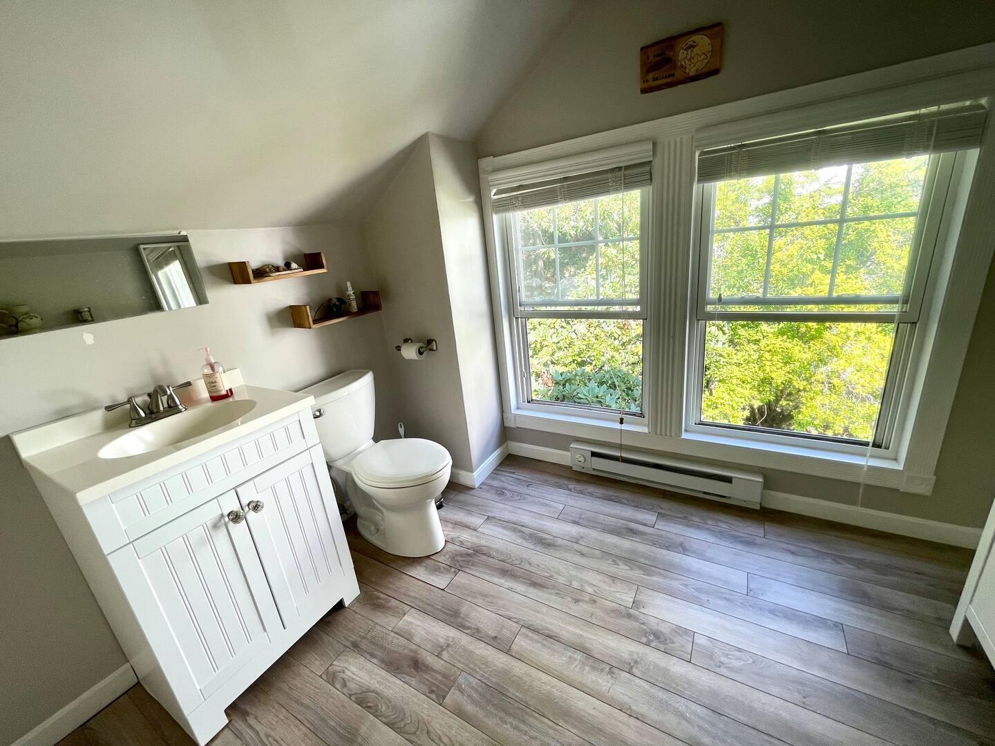 The half bath is attached to the master bedroom upstairs. - 186 Linwood St