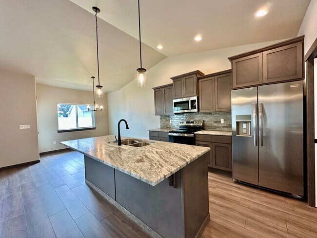 Building Photo - New Build Ranch Style Home Available with RV or Boat Garage!!