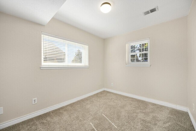 Building Photo - Spacious 3-Bedroom Home with 4th bedroom on lower level & Attached Garage
