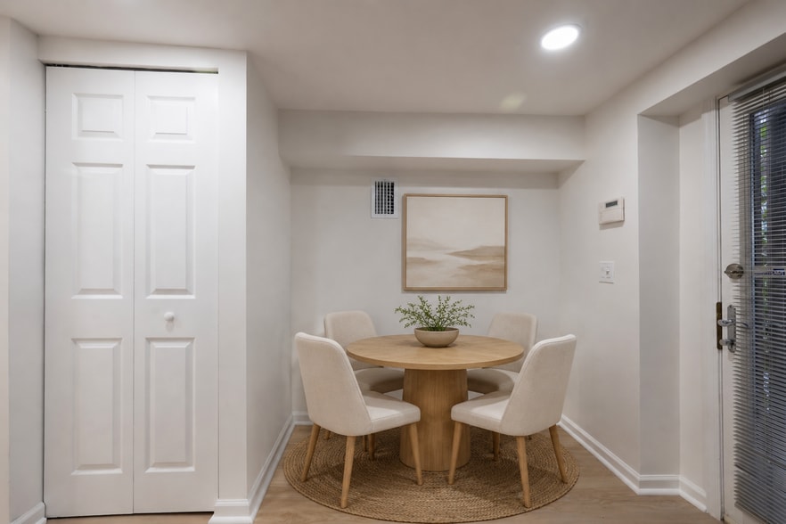 Digitally Staged Dining Area - 3223 1st St N