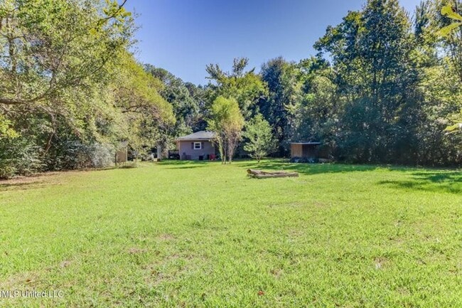 Building Photo - Long beach home now available for rent