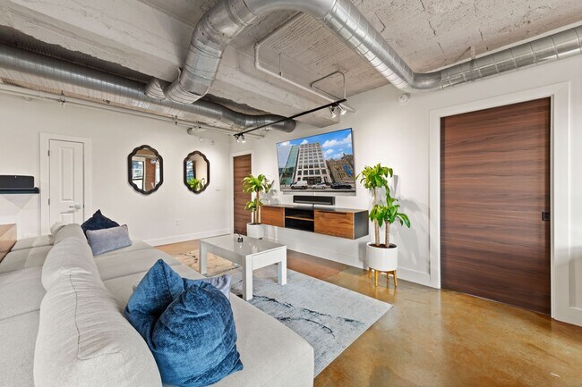 Building Photo - Fully Furnished Designer Loft with Parking & Monument Views!