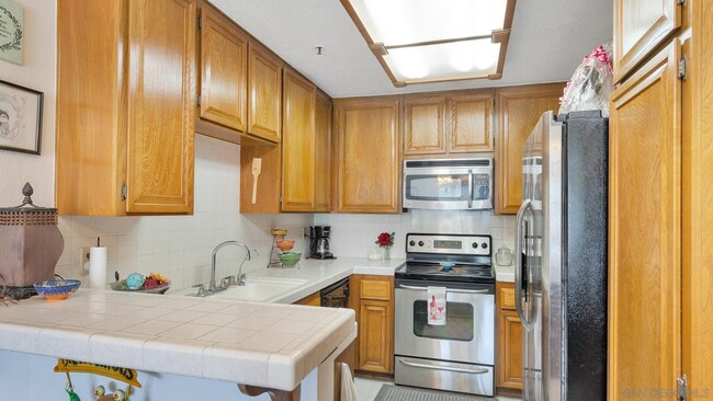 Building Photo - 5765 Friars Rd