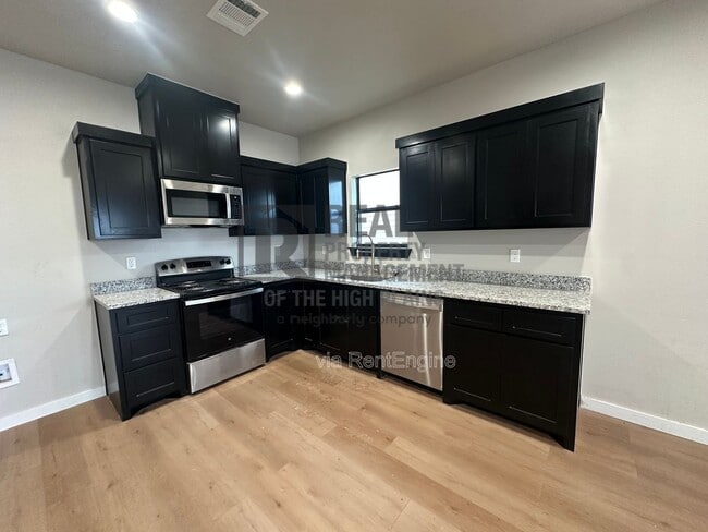 Building Photo - 4780 Clive -