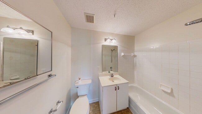 Building Photo - Ground Level 3 + 2 Spacious Updated condo