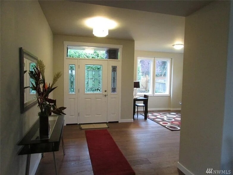 Front entry and office to the right. There is also a large 1/2 bath and large closet to the right. - 15828 25th Ave NE