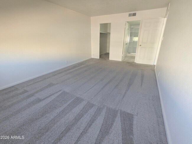 Building Photo - 7910 E Camelback Rd