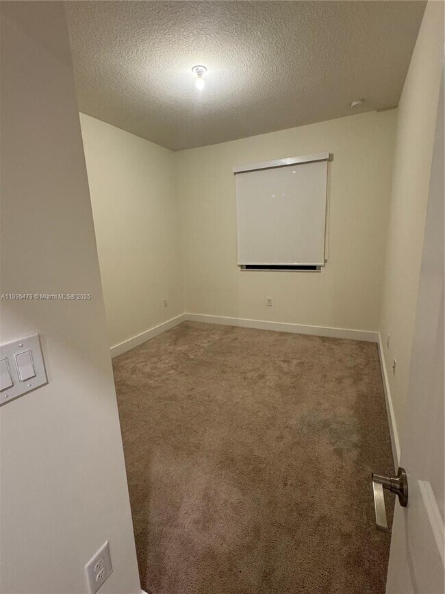 Building Photo - 4693 NW 83rd Pl