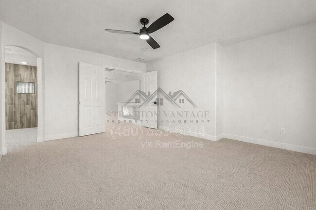 Building Photo - 1005 E Stirrup Ln