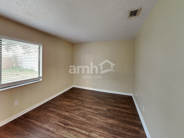 Building Photo - 4615 Tiffany Woods Cir