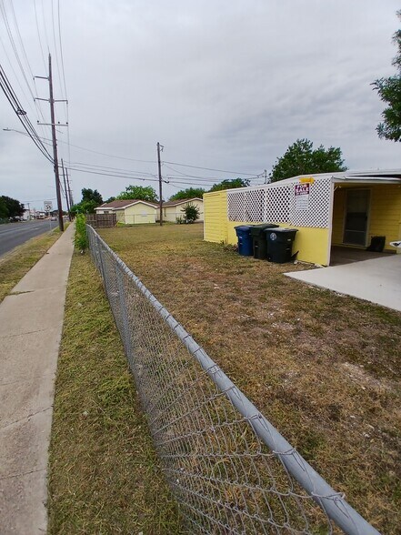Side of house with car port. - 4502 Odem Dr