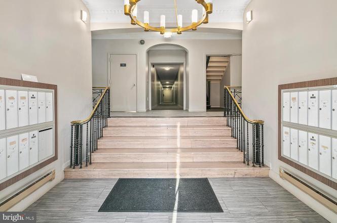 Building entrance with keyless entry, Building lobby with locked mailboxes for each unit - 3719 12th St NE