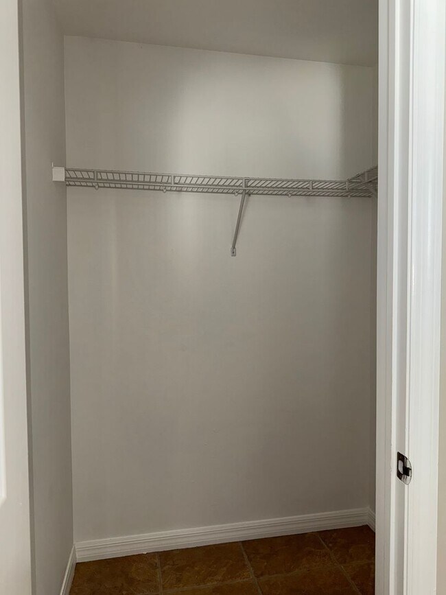 Building Photo - Experience this Cape Coral 3 bedroom 2 bath corner duplex with 1 car garage and screened in lanai.