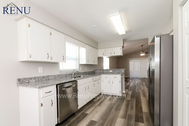 Building Photo - This Summer Special is Heating Up!: 50% of...