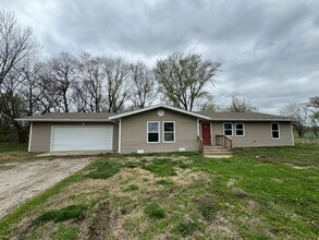 Building Photo - Country living with this large 3 bedroom 2 full bath home