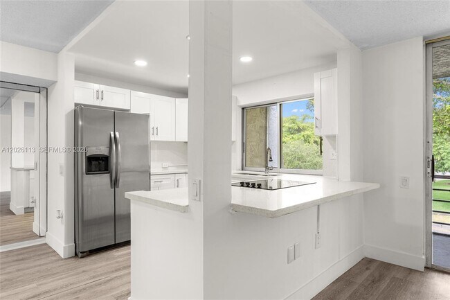 Building Photo - 9091 Lime Bay Blvd