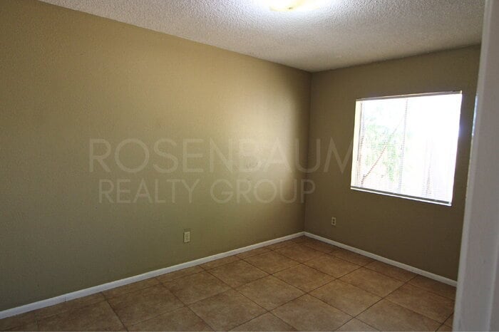 Building Photo - 6440 E Alder Ave